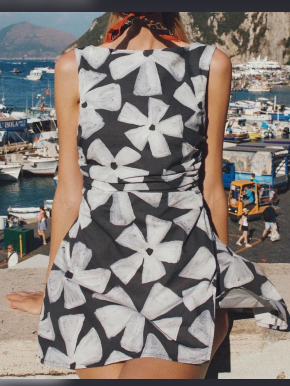 Sleeveless Black Mini Dress with White Floral Motif